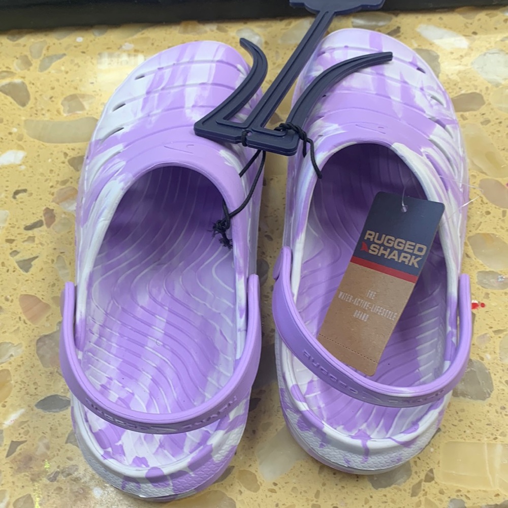 Purple and white crocs